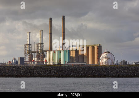 Industrial buildings on the shore Stock Photo