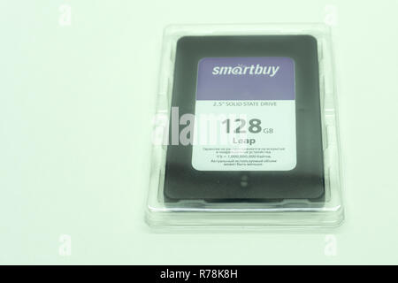 SSD vs HDD new and old technology on white smartbay, Russia Berezniki 13 November 2017 Stock Photo