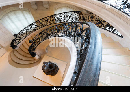 Circular staircase with the statue Ugolino and His Son by Jean-Baptiste Carpeaux, Petit Palais, Paris, France Stock Photo