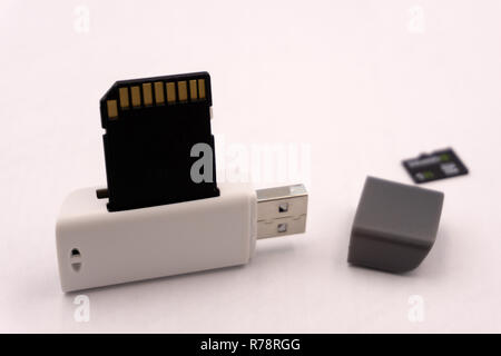Flash memory card reader isolated on white Stock Photo