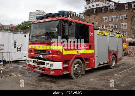 July 2017 - Old fire tender used by a demolition contractor as a dust suppression unit Stock Photo