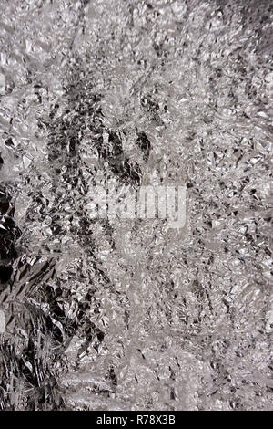 Metal foil texture in black and white. Abstract background and texture for design Stock Photo