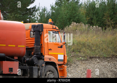 big fuel truck goes on the country highway Stock Photo