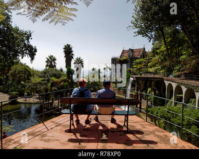 A great place to sit, relax and enjoy the wonderful tropical gardens high above Funchal on the Portugese island of Madeira Stock Photo