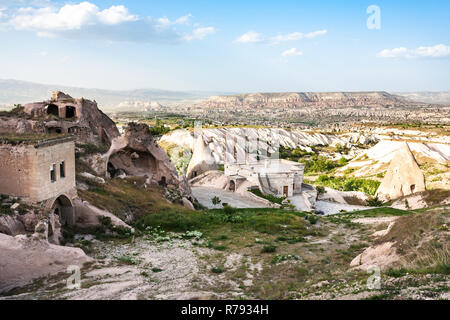 rock carved houses in Uchisar town in Cappadocia Stock Photo