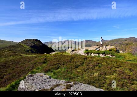 Eagle Crag, Lake District, England - 24th June 2018:Taking photos on Eagle Crag Stock Photo