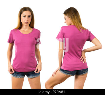 Photo of a woman posing with a blank pink t-shirt ready for your artwork or design. Stock Photo