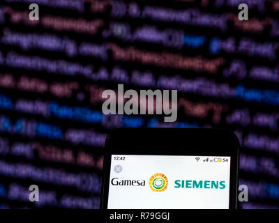 Siemens Gamesa Renewable Energy logo seen displayed on smart phone. Stock Photo