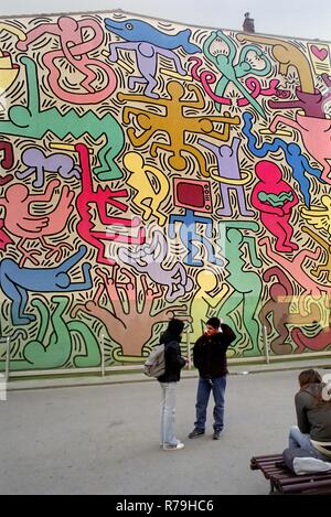 Pisa Italy, the 'Tuttomondo' mural created by the American painter and writer Keith Haring Stock Photo