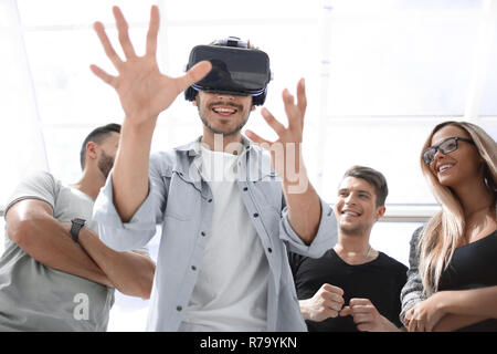 Indoors close up shot of men wearing virtual reality glasses Stock Photo