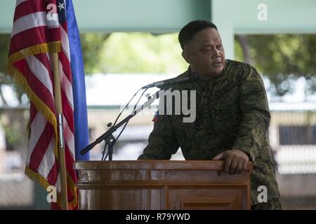 Philippine Army Col. Laurence Mina delivers his remarks during the opening ceremony of Balikatan 2017 at Fort Magsaysay in Santa Rosa, Nueva Ecija, May 8, 2017. Balikatan is an annual U.S.-Philippine bilateral military exercise focused on a variety of missions including humanitarian and disaster relief, counterterrorism, and other combined military operations. Stock Photo