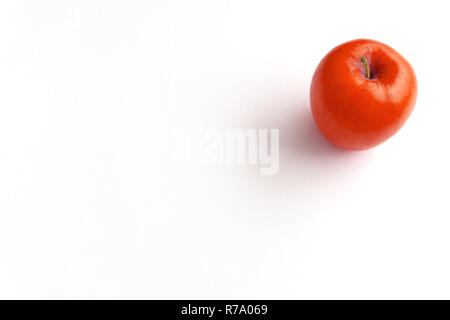 Close-up of a Red shiny Apple isolated on white Background Stock Photo