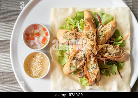 Deep fried Spring roll in white plate Thai food Stock Photo