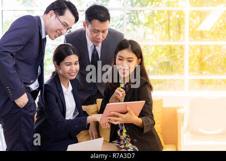 Business people having a conversation in the cafe on coffee time Stock Photo