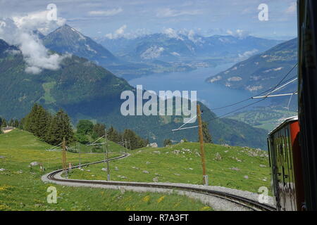 with the cog railway above lake thun Stock Photo