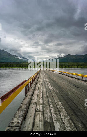 Bridge over Susitna river under the clouds, Alaska Stock Photo