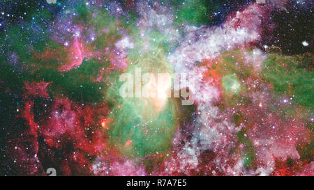 Nebula and star field against space. Elements of this image furnished by NASA. Stock Photo