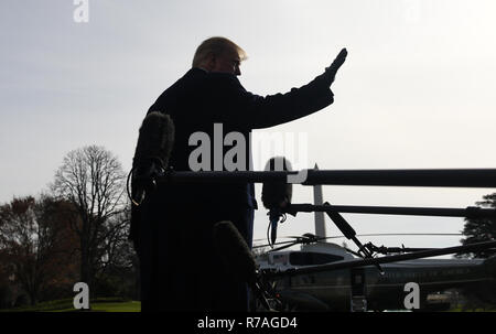 Washington, DC. 8th Dec, 2018. United States President Donald J. Trump answers questions from the press while departing the White House December 8, 2018 in Washington, DC. Trump announced White House Chief of Staff John Kelly will resign by the end of the year before departing for the 119th Army-Navy Football Game in Philadelphia, Pennsylvania. Credit: Olivier Douliery/Pool via CNP | usage worldwide Credit: dpa/Alamy Live News Stock Photo