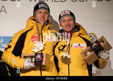 Sigulda, Latvia. 08th Dec, 2018. Bob: World Cup, two-man bobsleigh, men: The Germans Francesco Friedrich and Alexander Schüller are happy about their victory. Credit: Viesturs Lacis/dpa/Alamy Live News Stock Photo