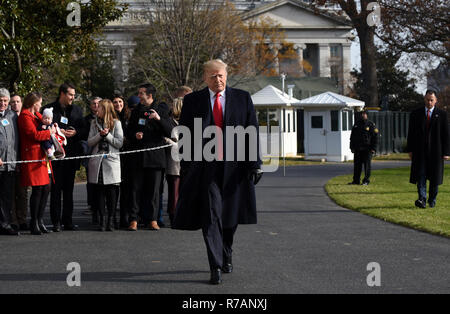 Washigton, USA. 8th Dec 2018. United States President Donald J. Trump walks towards the press while departing the White House December 8, 2018 in Washington, DC. Trump announced White House Chief of Staff John Kelly will resign by the end of the year before departing for the 119th Army-Navy Football Game in Philadelphia, Pennsylvania Credit: Olivier Douliery/CNP/ZUMA Wire/Alamy Live News Stock Photo