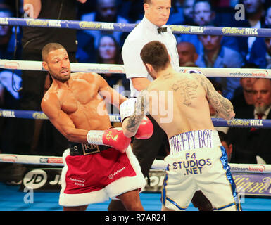 Sheffield, UK. 8th Dec 2018.   Kell Brook (Red Shorts) v Michael Zerafa (White/Blue Shorts) during the Final Eliminator contest for the WBA World Super-welterweight Title.  Credit: Touchlinepics/Alamy Live News Stock Photo