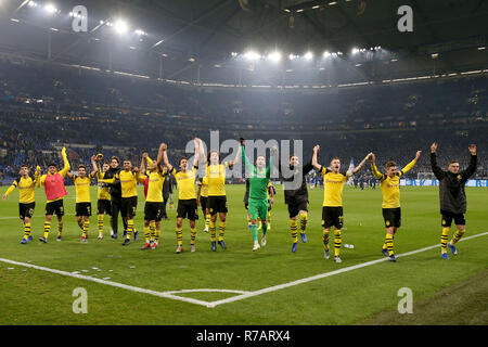 Gelsenkirchen, Germany. 8th Dec, 2018. Players of Dortmund celebrate winning after the Bundesliga match between FC Schalke 04 and Borussia Dortmund at Veltins-Arena in Gelsenkirchen, Germany on Dec. 8, 2018. Dortmund won 2-1. Credit: Joachim Bywaletz/Xinhua/Alamy Live News Stock Photo