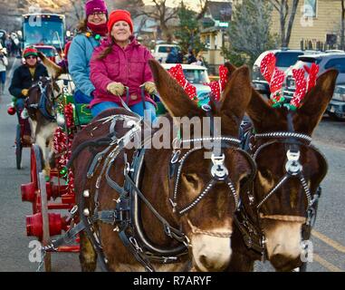Albuquerque, USA. 8th Dec, 2018. People participate in the annual Christmas parade in a small town of Madrid, New Mexico, the United States, on Dec. 1, 2018. The small town of Madrid holds its Christmas parade in early December, on Dec. 1 this year. The yearly Christmas parade reflects the eclectic nature of the town and its only handful residents. TO GO WITH Feature: Christmas parade in New Mexico ghost town Credit: Richard Lakin) (zxj/Xinhua/Alamy Live News Stock Photo