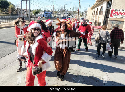 Los Angeles, USA. 8th Dec, 2018. Revelers take part in the 2018 SantaCon in Los Angeles, the United States on Dec. 8, 2018. Credit: Zhao Hanrong/Xinhua/Alamy Live News Stock Photo