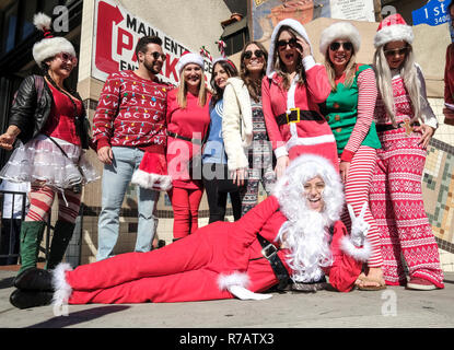 Los Angeles, USA. 8th Dec, 2018. Revelers take part in the 2018 SantaCon in Los Angeles, the United States on Dec. 8, 2018. Credit: Zhao Hanrong/Xinhua/Alamy Live News Stock Photo