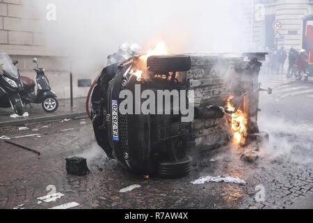 France. 8th Dec, 2018. Car burning in a street of Paris during the ...