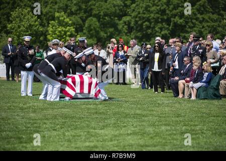 Marines take part in the graveside service for Marine Corps Reserve 1st Lt. William Ryan, in Arlington National Cemetery, Arlington, Va, May 10, 2017.  Declared deceased as of May 11, 1969, Ryan’s remains from the Vietnam War were missing until identified by Defense POW/MIA Accounting Agency (DPAA) in 2016 from an excavated crash site near Ban Alang Noi, Laos. Ryan’s remains were repatriated in Section 60. Stock Photo