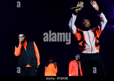 Myles Stephenson, Ashley Fongho, Mustafa Rahimtulla and Jamaal Shurland of Rak-Su on stage during day one of Capital's Jingle Bell Ball with Coca-Cola at London's O2 Arena. Stock Photo