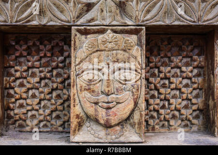 Vashisht, India - May 27, 2017: Traditional wooden carving on the hindu temple in Vashisht village in Kullu valley, Himachal Pradesh, India Stock Photo