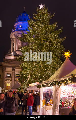 Berlin, Germany - December 6, 2017: Decorated booths and christmas lights at Gendarmenmarkt Christmas Market. Stock Photo