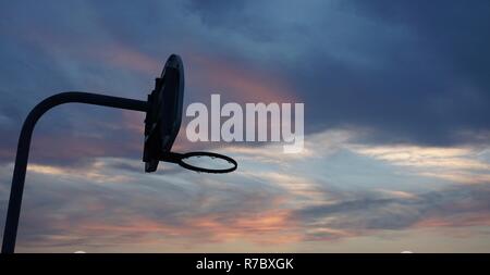 Basketball at Sunset Stock Photo