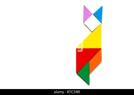 Color wood tangram puzzle in cat shape on white background Stock Photo