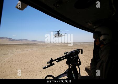 U.S. Marine Corps Cpl. Gregory Bolner, left, a light armored vehicle ...