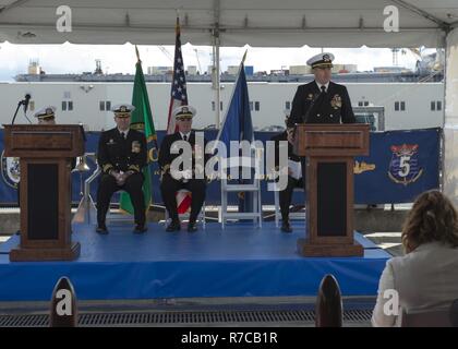 Cmdr. Carl Trask from Glendora California is rung ashore for