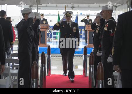 Cmdr. Carl Trask from Glendora California is rung ashore for the