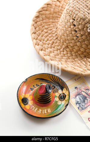 Mexican Souvenir Straw Hat, Ashtray Sombrero and Bull Fight Ticket Stock Photo