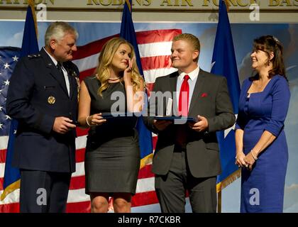 U.S. Army Reserve Maj. Lisa Jaster, left, became the third woman to ...