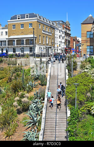 Southend on Sea people step up & down long stairway steps from holiday resort seaside seafront to Southend town centre shopping high street Essex UK Stock Photo