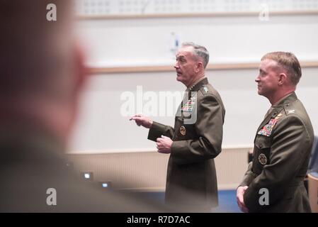 U.S. Marine Corps Gen. Joseph F. Dunford, Jr., chairman of the Joint Chiefs of Staff, speaks before an award ceremony for U.S. Marine Col. Philippe ‘Boz’ Rogers, U.S. Military Delegation to the North Atlantic Treaty Organization (NATO) Chief of Staff, during a Military Committee in Chiefs of Defense (MC/CS) Session at NATO Headquarters, May 17, 2017. The Chiefs of Defense meet to discuss Afghanistan, countering terrorism and other NATO operations and missions to provide the North Atlantic Council with consensus-based military advice on how to best meet global security challenges. (DoD Stock Photo