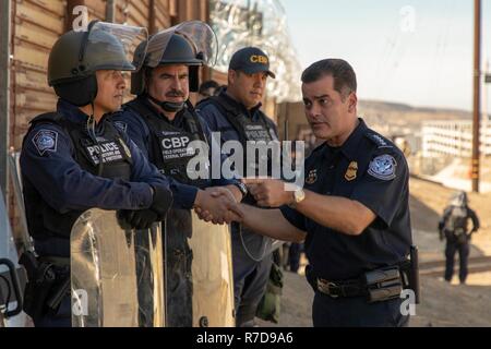 CBP Deputy Commissioner Robert Perez visited the San Ysidro Port of Entry and went on a ride along with Border Patrol on Tuesday. During his visit, the  Deputy  Commissioner was briefed on port hardening operations and the reinforcements along the border wall. Other CBP participants included San Diego Field Office Director of Field Operations Pete Flores, San Diego Sector Chief Patrol Agent Rodney Scott, San Diego Air and Marine Operations Director Hunter Davis, San Ysidro Port Director Sidney Aki, Executive Director Southwest Region Air and Marine Operations Keith Jones. Stock Photo