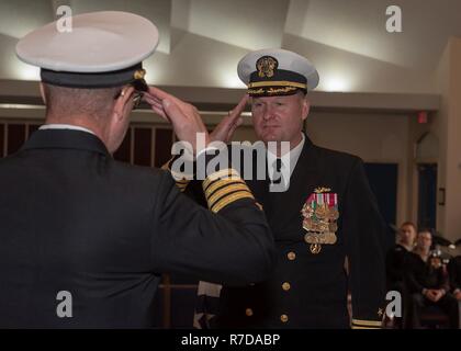 KINGS BAY, Ga., (Nov. 29, 2018) Capt. Chester T. Parks, right, salutes Capt. Brian Lepine, during a change of command ceremony aboard Naval Submarine Base Kings Bay. Parks is the 22nd commanding officer of Kings Bay. Stock Photo