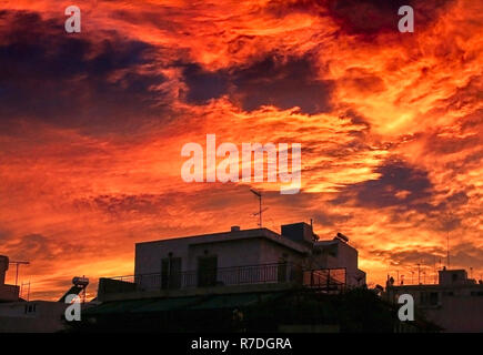 A very dramatic red sky over the city. Stock Photo