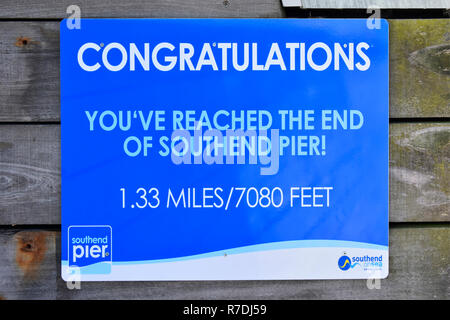 Congratulations sign to walkers on famous longest distance pleasure pier in the world at Southend on sea River Thames estuary seaside Essex England UK Stock Photo