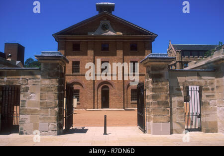 VIEW THROUGH MAIN GATES TO HYDE PARK BARRACKS, MACQUARIE STREET, SYDNEY, NEW SOUTH WALES, AUSTRALIA. THE BARRACKS ONCE HOUSED CONVICTS. Stock Photo