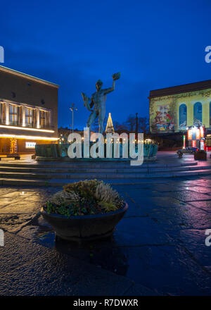 Poseidon statue in the city centre of gothenburg and in the background chritmas decarion at liseburg park Stock Photo