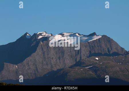Snow-covered mountain tops. Orsta, Norway Stock Photo
